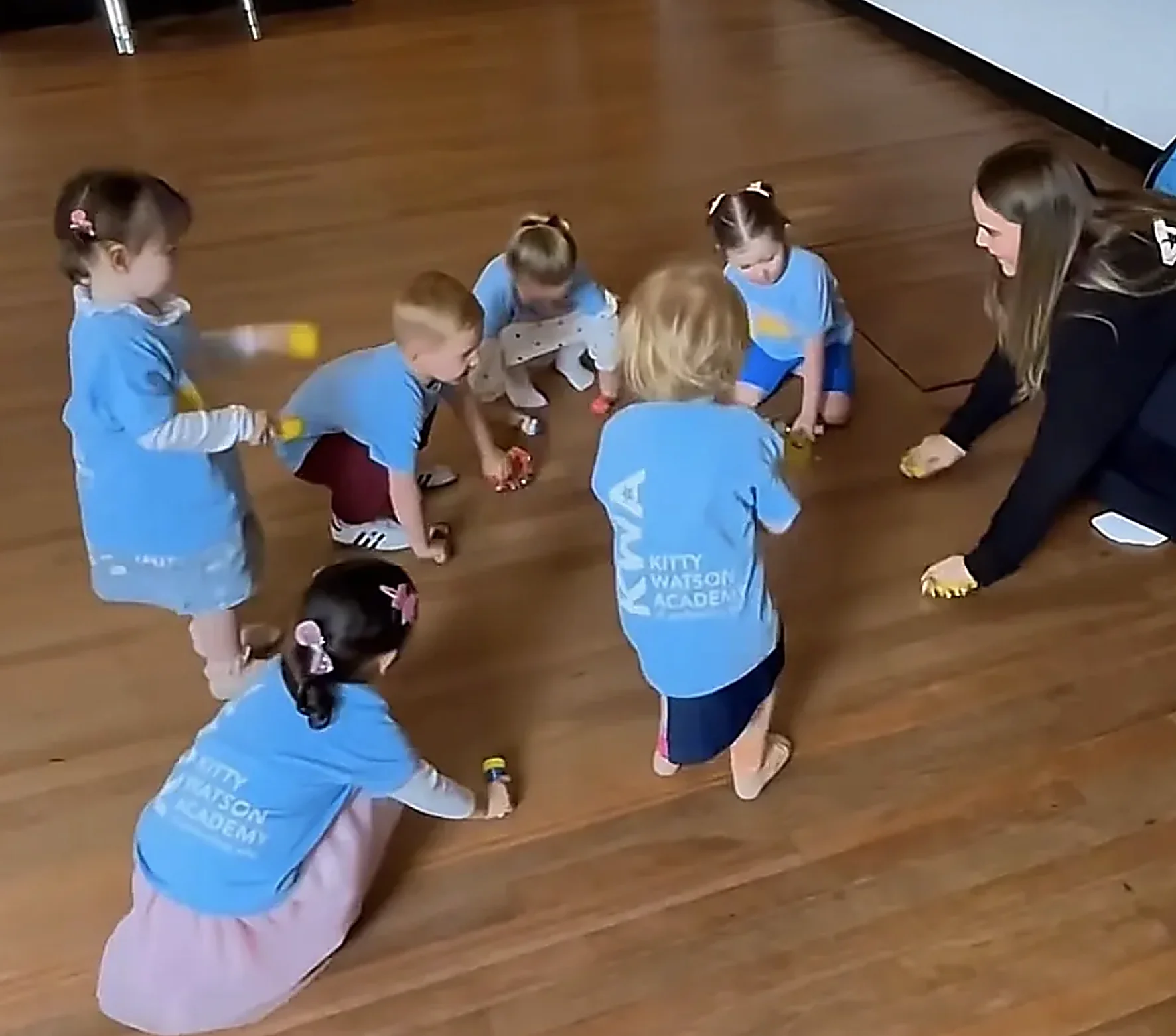 Toddlers enjoying a Broadway Babes class with their teacher