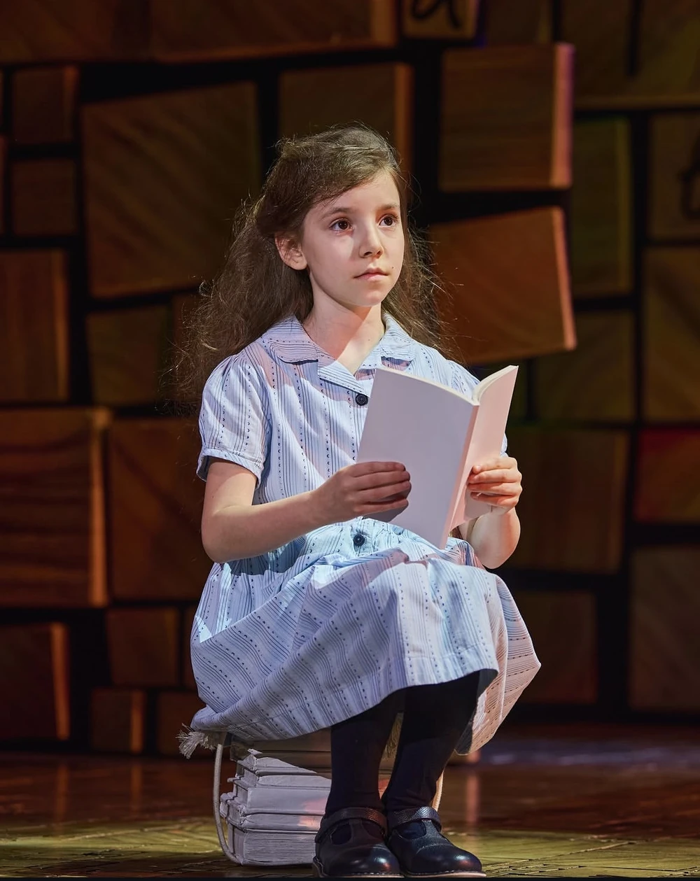 Caroline Ravansari performing as Matilda in the Matilda UK & Ireland Tour